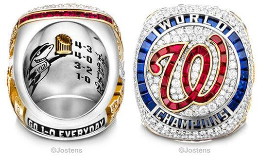 Close-up of the 2019 Washington Nationals World Championship ring, showcasing the detailed design with the team's logo, diamond embellishments, and engraved playoff series scores.