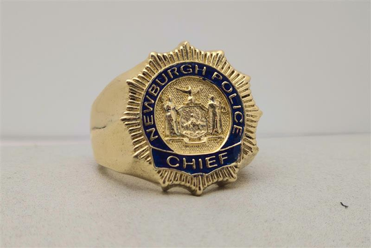 Gold Newburgh Police Chief ring featuring blue enamel badge and New York state emblem.