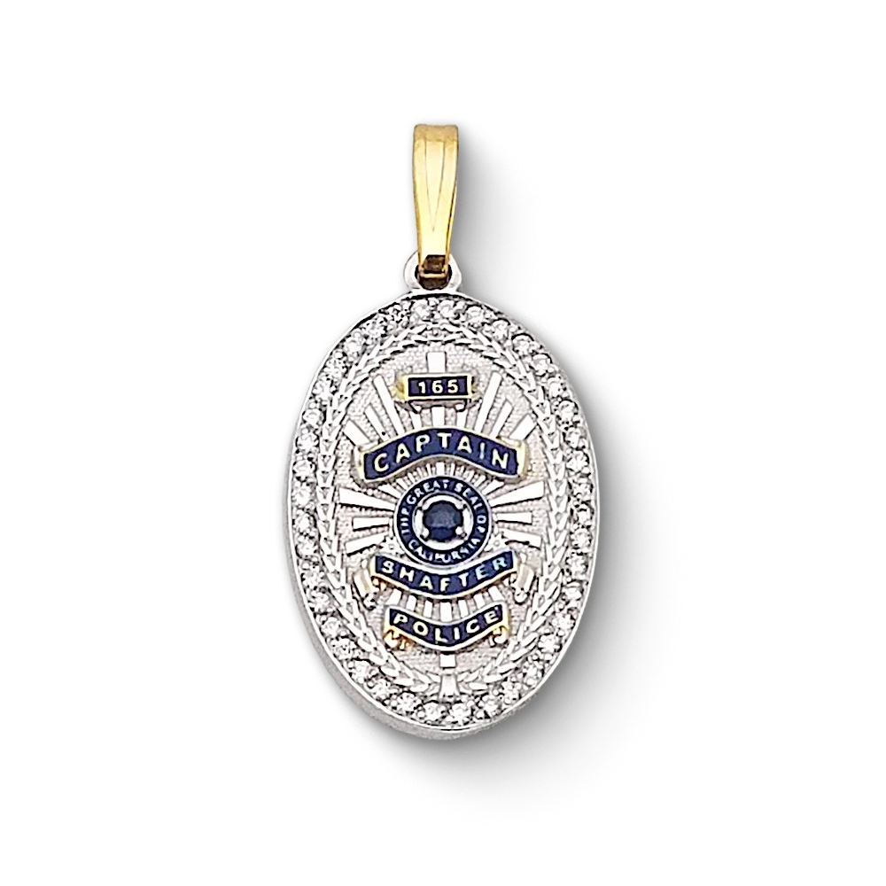 Close-up of a Shafter Police Department Captain badge pendant featuring intricate silver and blue details with the inscription 'Captain' and 'Shafter Police' at the center.