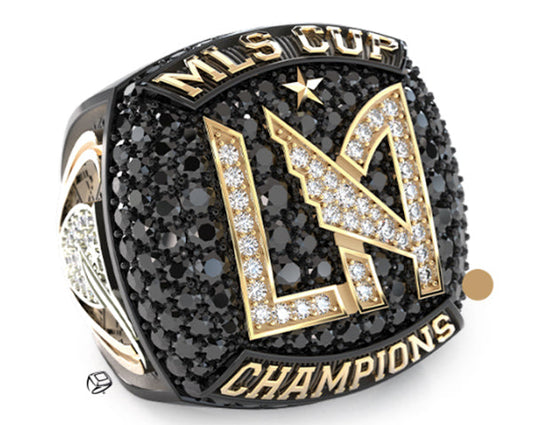 LA Galaxy MLS Cup Championship ring with black diamonds, gold accents, and the 'LA' logo symbolizing the team's victory.