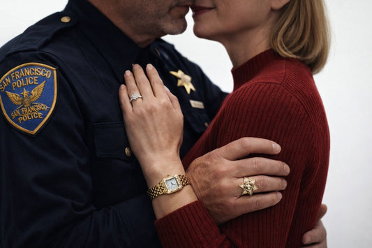 A couple sharing a close moment, the man wearing a police uniform and a badge ring, the woman wearing a diamond ring and gold watch, symbolizing love and commitment on Valentine’s Day.