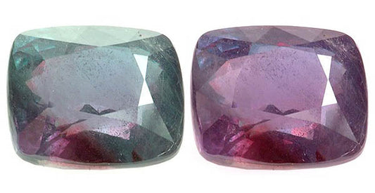 Two color-changing sapphires displaying purple and green hues, showcasing their unique ability to shift color under different lighting conditions.