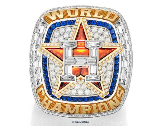 2023 World Championship ring featuring a large star with the letter 'H' in the center, surrounded by diamonds and blue sapphires, symbolizing victory and achievement.