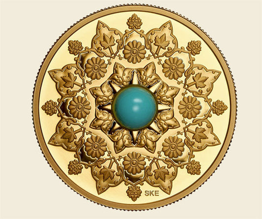 Intricate gold medallion featuring a floral pattern and a turquoise gemstone at the center, designed with detailed craftsmanship.