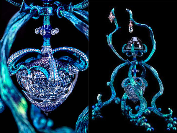 Intricate high-fashion jewelry featuring a blue and diamond-encrusted design with elaborate detailing and crystals.