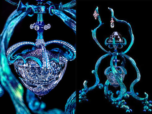 Intricate high-fashion jewelry featuring a blue and diamond-encrusted design with elaborate detailing and crystals.