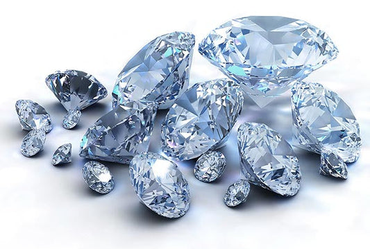 Collection of sparkling diamond gemstones in various shapes, showcasing clarity and brilliance.