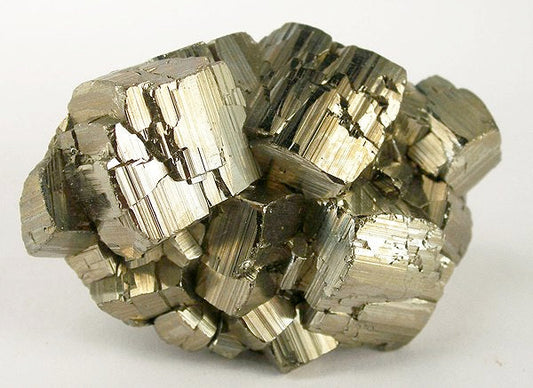 Pyrite crystal cluster with metallic gold luster, showcasing cubic formations of iron disulfide.