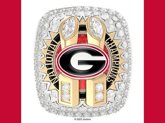 2023 National Championship ring featuring the University of Georgia logo surrounded by diamonds and gold details.
