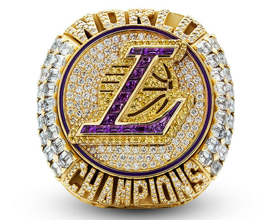 Los Angeles Lakers 2020 NBA Championship ring with a purple 'L' logo, surrounded by diamonds, and inscribed with 'WORLD CHAMPIONS'.