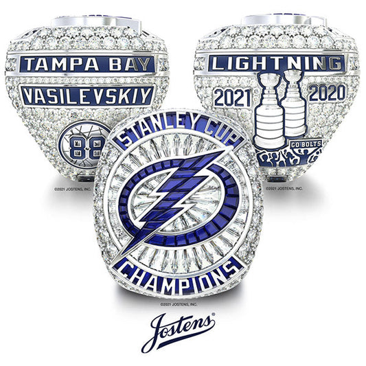 2020 and 2021 Tampa Bay Lightning Stanley Cup Championship rings featuring the team logo, player Vasilevskiy’s name, and diamond-encrusted designs celebrating their victories.