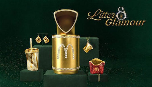Image featuring McDonald's branded jewelry collection, including a golden cup, fries, and earrings, with the text 'Litter & Glamour' displayed on a green background.
