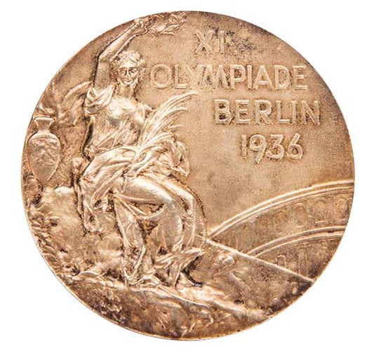 Close-up of the 1936 Berlin Olympic Games commemorative medal featuring a depiction of a woman holding a torch, with the engraved text 'XI Olympiade Berlin 1936'.