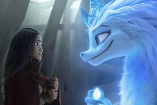 Scene from the animated movie 'Raya and the Last Dragon,' featuring a young girl named Raya facing a friendly, mystical dragon with glowing blue features in a magical setting.