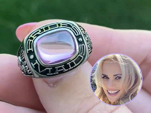 Close-up of a silver 'Bridesmaid' ring with a purple gemstone, being held by a person, with a smiling woman in the inset photo.