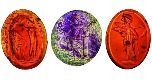 Three ancient engraved gemstone seals in varying colors: red, green, and orange, featuring intricate depictions of historical figures, likely from Roman or Greek times.