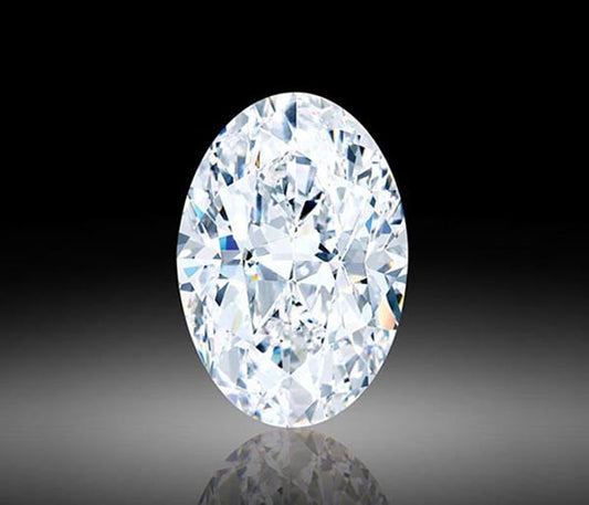 Close-up of a sparkling oval-cut diamond, showcasing its brilliance and clarity against a black background. The diamond reflects light, highlighting its fine facets and pristine quality.
