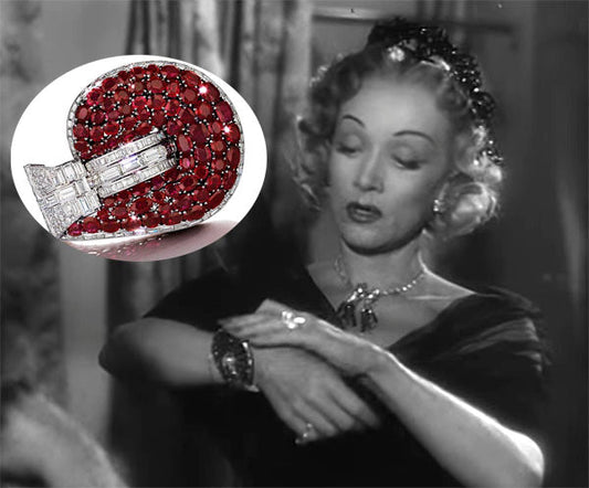 Vintage black and white photo of a woman adjusting a ruby and diamond bracelet, with a close-up of the bracelet featuring red rubies and diamonds in an elegant design.