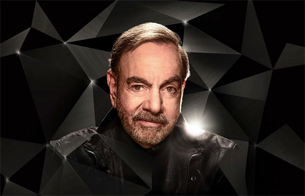 Neil Diamond portrait surrounded by geometric dark patterns, looking serious with a beard and wearing a black jacket.