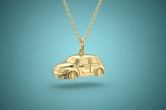 A gold PT Cruiser car pendant hanging from a gold chain, displayed against a smooth teal gradient background.
