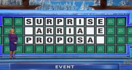 Scene from a Wheel of Fortune game show, displaying a partially filled puzzle with the clue 'SURPRISE MARRIAGE PROPOSAL' under the category 'EVENT'.