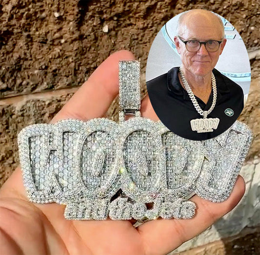 Close-up of a custom diamond pendant spelling 'WOODY' from 'Woody and the Jets' worn by a man, with an inset photo of him wearing the necklace.